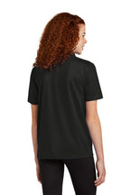 Sport-Tek YST740 youth UV performance school polo in Black – model back view