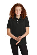 Sport-Tek YST740 youth UV performance school polo in Black – model front view